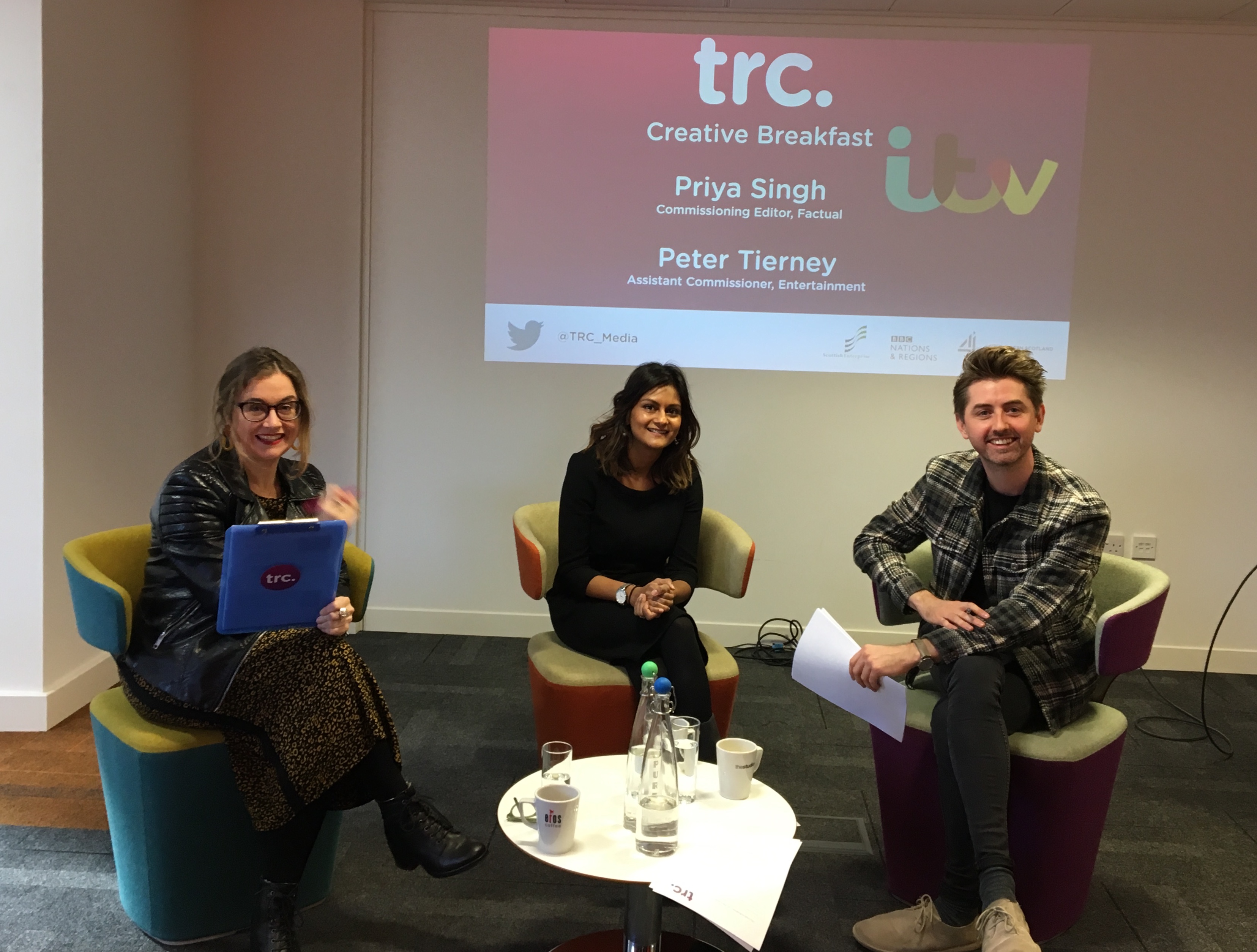 Claire Scally, Priya Singh  and Peter Tierney smiling at the camera.